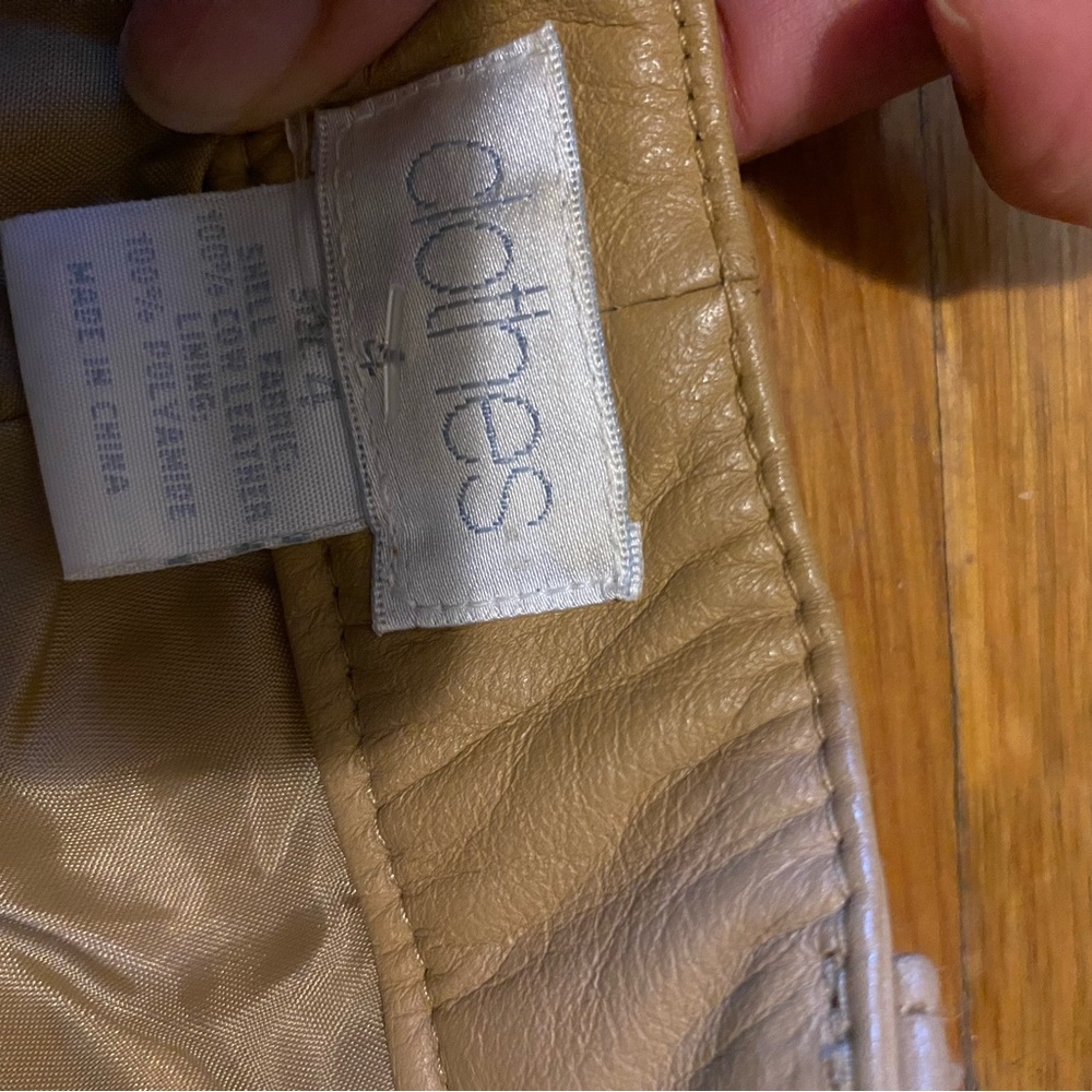 Women real leather pants size 4, it’s too small fit for 0, color tan